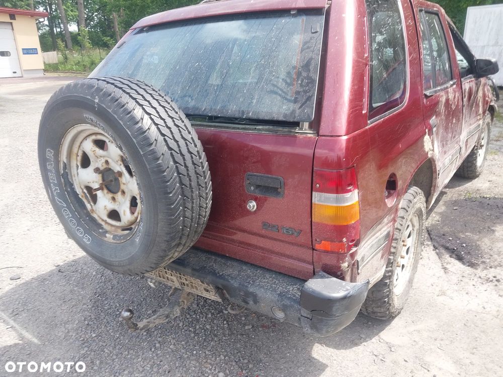 Opel Frontera A Koło zapasowe mocowanie koła zapasowego dojazdówki - 2
