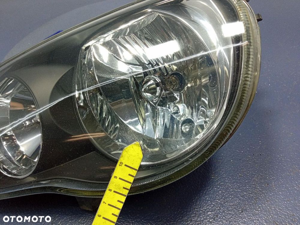 TOYOTA COROLLA E11 LIFT 99-02 REFLEKTOR LEWY LAMPA EU 20-5954 - 6