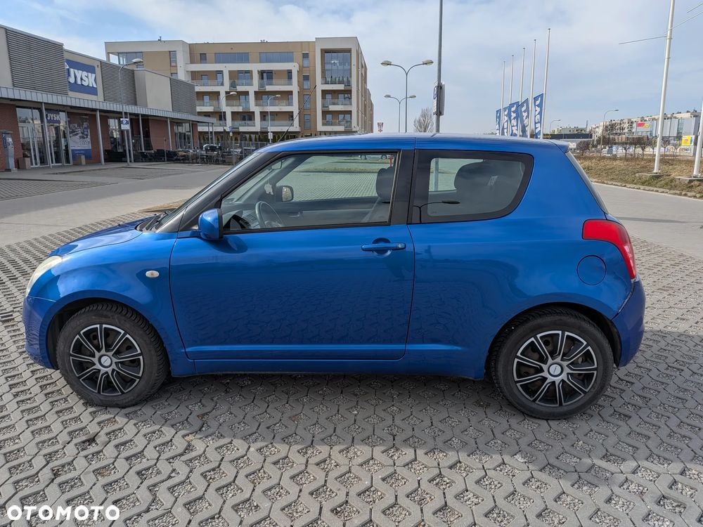 Suzuki Swift 1.3 Sakura - 13
