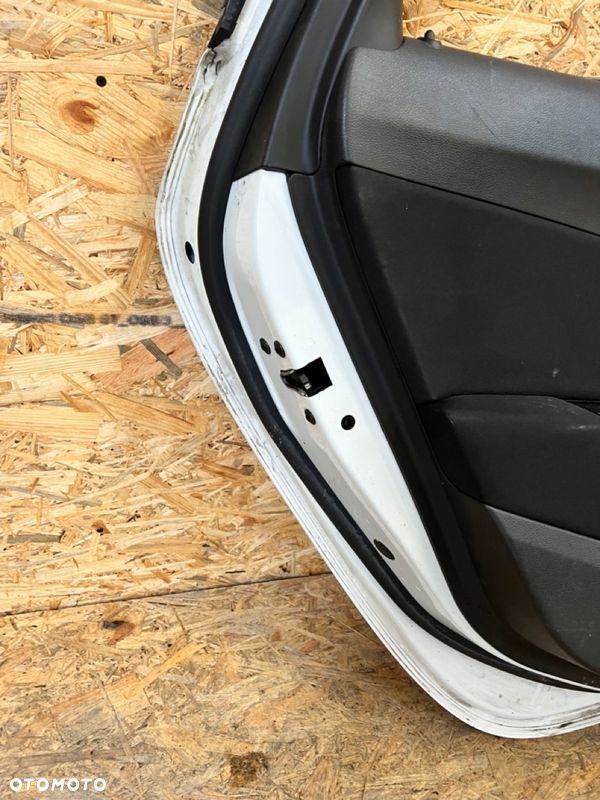 Drzwi TYLNE LEWE lewy tył OPEL ASTRA J IV KOMBI Lakier: GAZ Z40R - 13