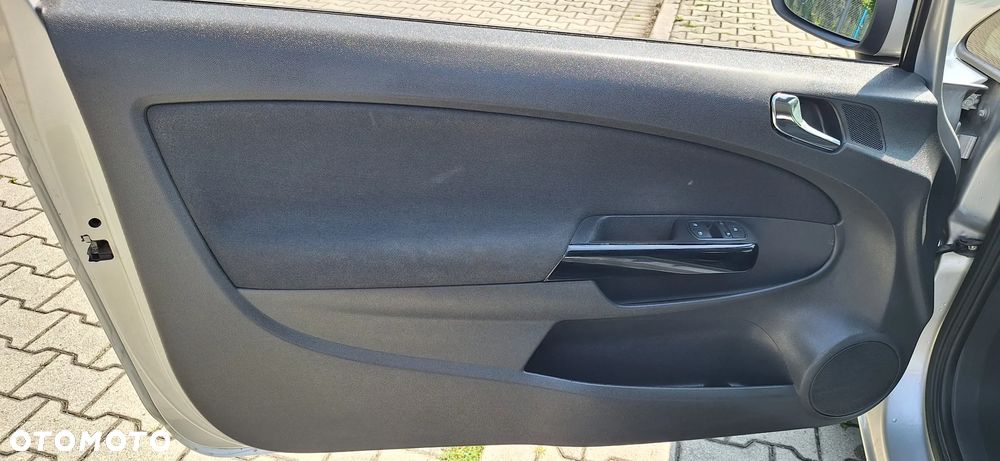 Opel Corsa 1.2 16V Enjoy - 11
