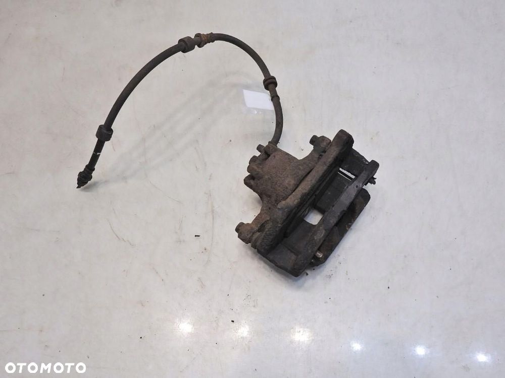 ZACISK HAMULCOWY PRAWY PRZÓD MITSUBISHI LANCER VIII 1.8 - 5