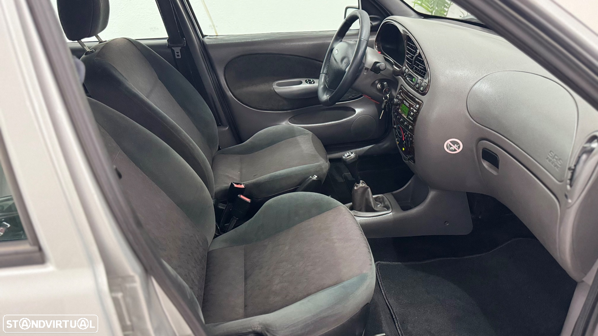 Ford Fiesta 1.25 Ghia - 9