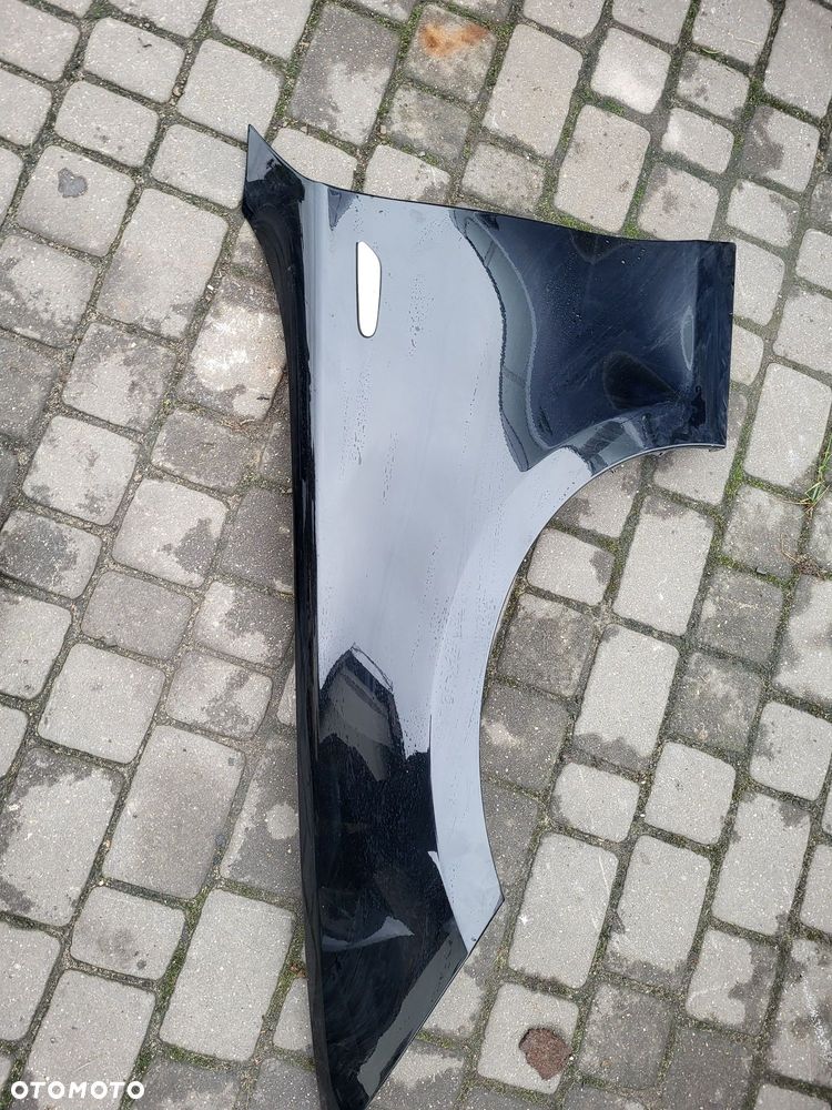Błotnik lewy  bmw 1 e87 2010r lakier Schwarz 2 bez korozji