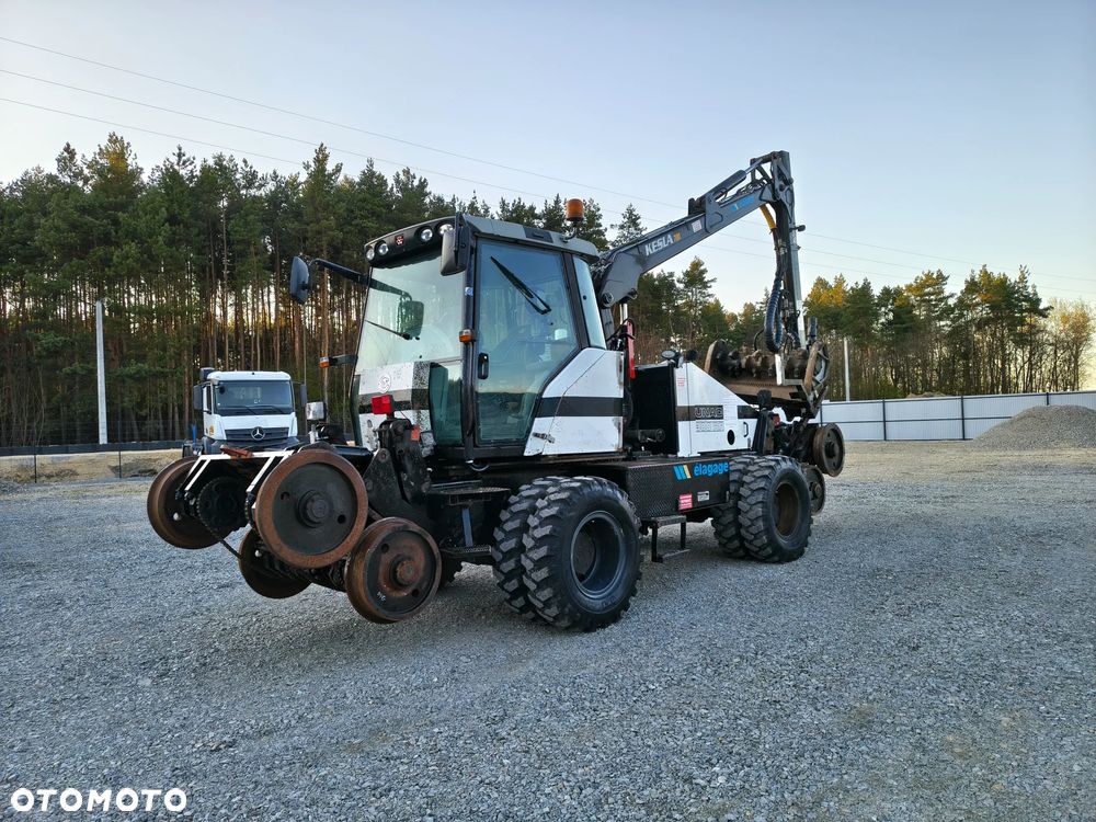 Caterpillar UNAC 300RR Mulczer kolejowy Liebherr atlas dwudrogowy zw - 2