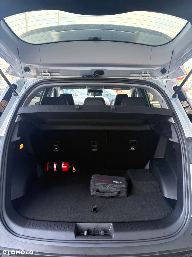 Chery Tiggo 4 1.5 T-GDI HEV Prestige DHT - 6