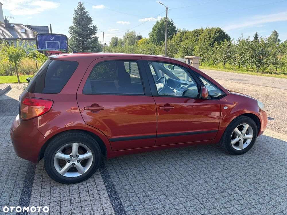 Suzuki SX4 1.6 GLX / Comfort - 4