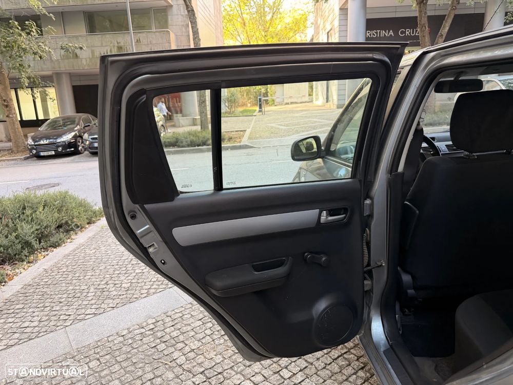 Suzuki Swift 1.3 DDiS Quiksilver - 13