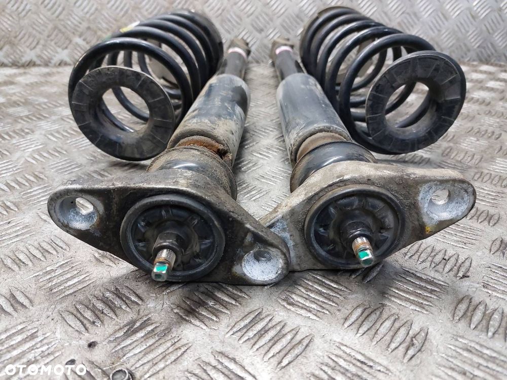 AMORTYZATORY TYŁ + SPRĘŻYNY KIA CARENS IV LIFT - 2