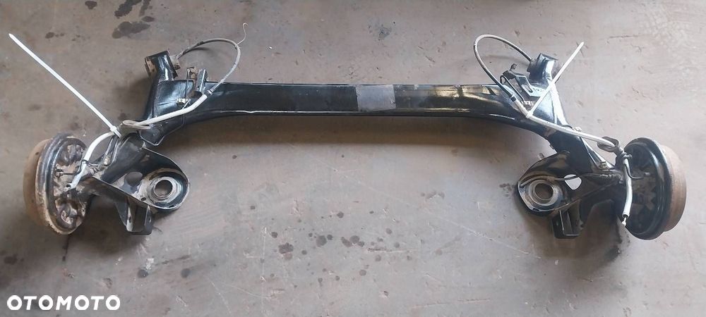 BELKA OŚ ZAWIESZENIA TYŁ BĘBNY Z ABS SKODA FABIA I HB 5D - 1