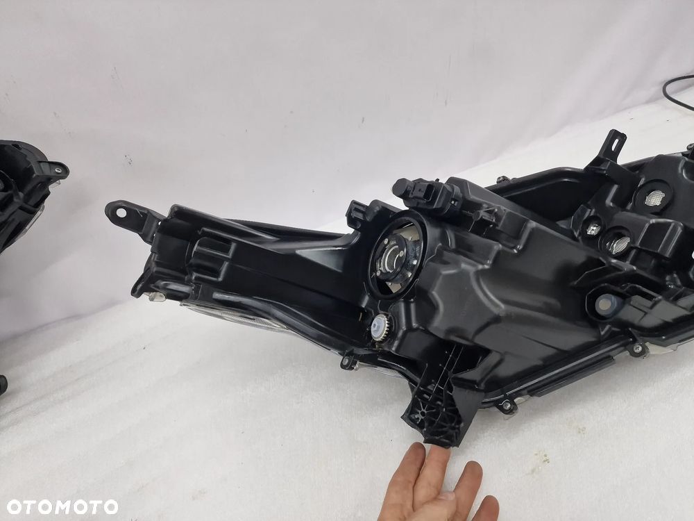 TOYOTA YARIS IV 19- LEWA / PRAWA ZWYKŁA SOCZEWKA LAMPA PRZEDNIA PRZÓD , NR KOITO K0-6 , NR AUKCJI LA47 - 34