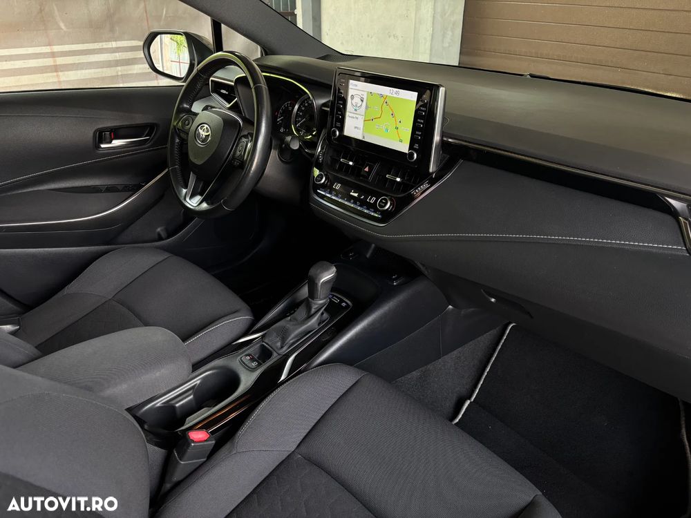 Toyota Corolla 1.8 HSD Business - 30