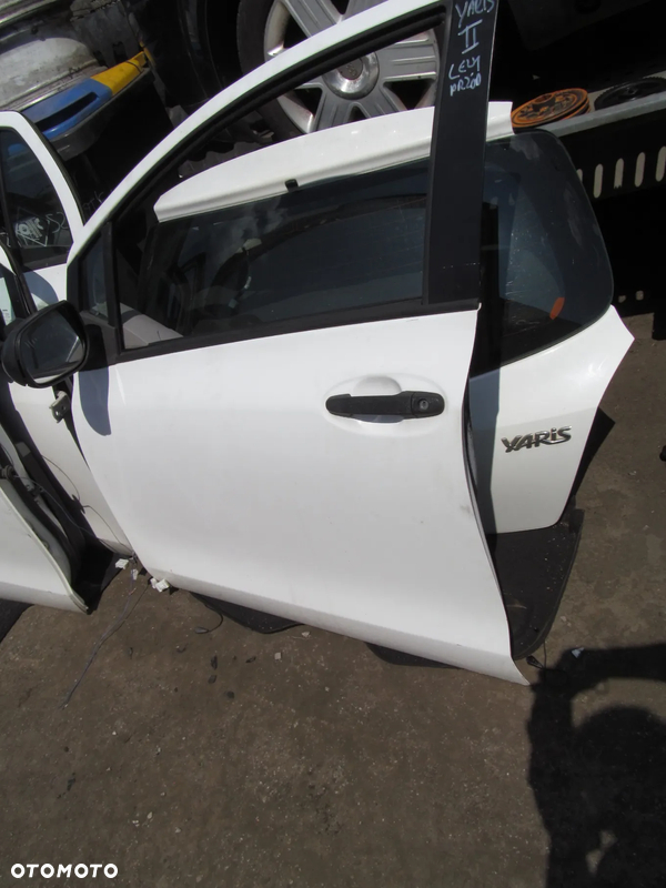 Drzwi przód kompletne prawe lub lewe do toyota Yaris II 5d