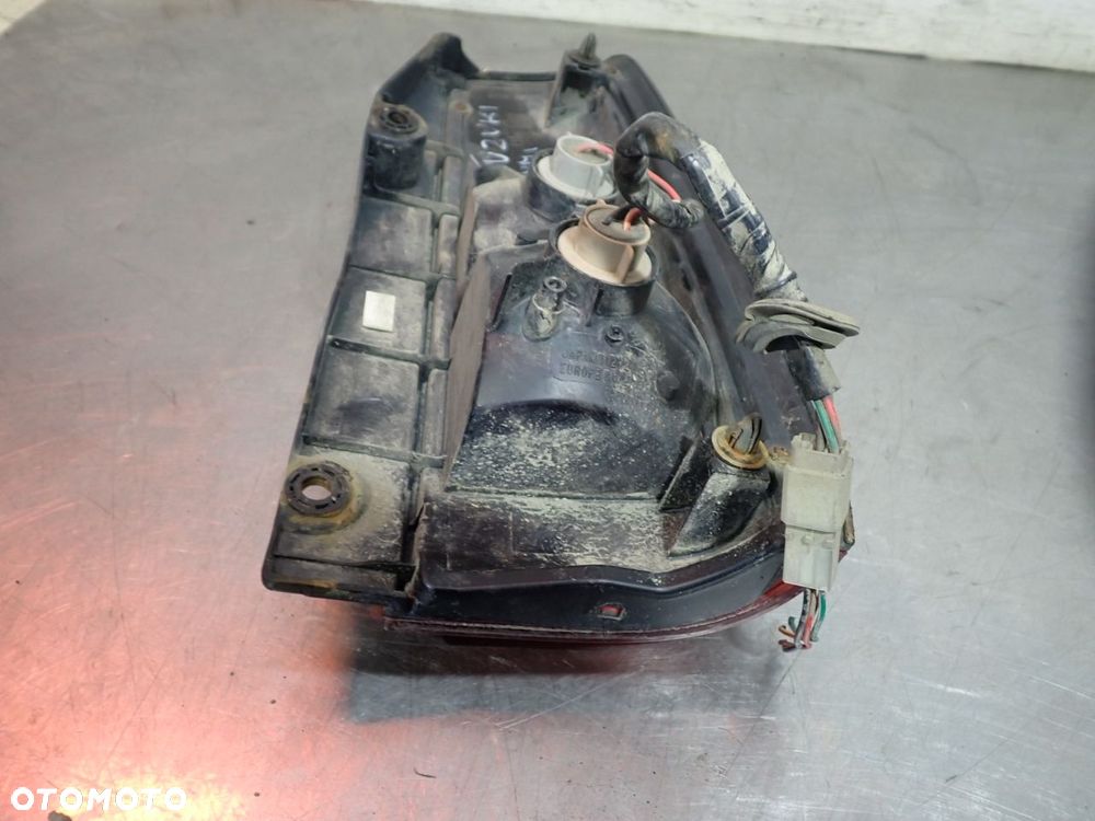 LAMPA LEWA TYLNA SUZUKI JIMNY III - 7