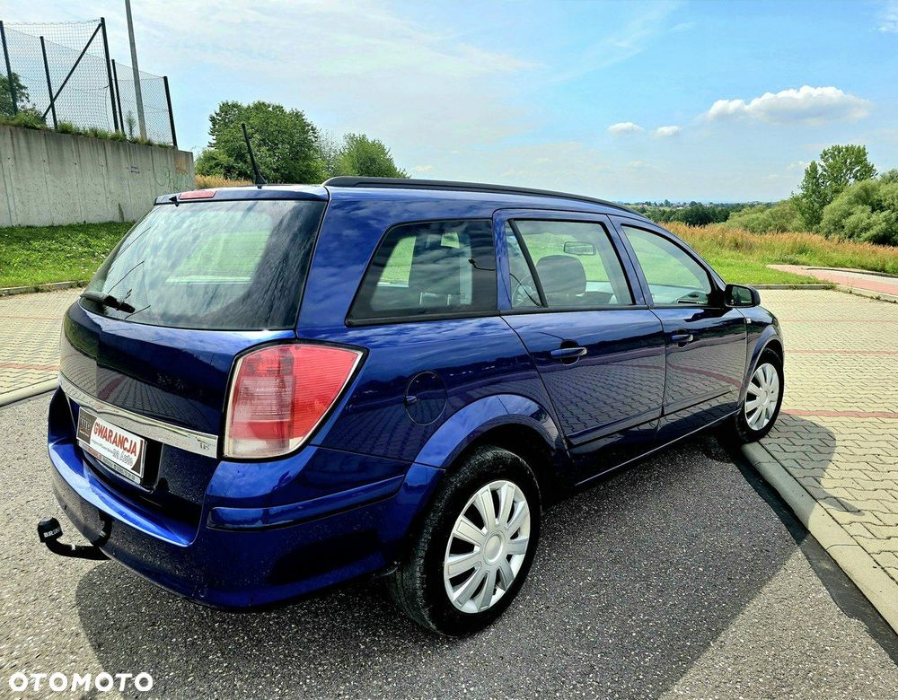 Opel Astra 1.8 Caravan Edition - 14