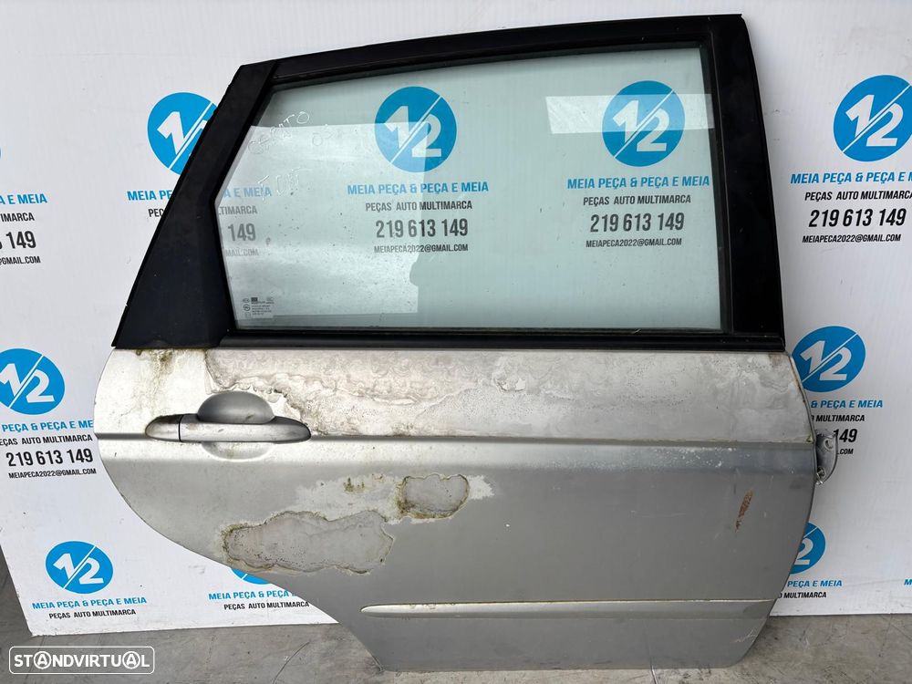 Porta traseira direita Kia Cerato - 1