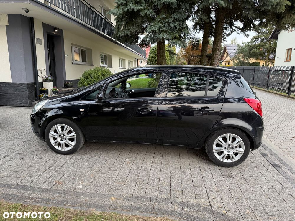 Opel Corsa 1.2 16V Cosmo - 8