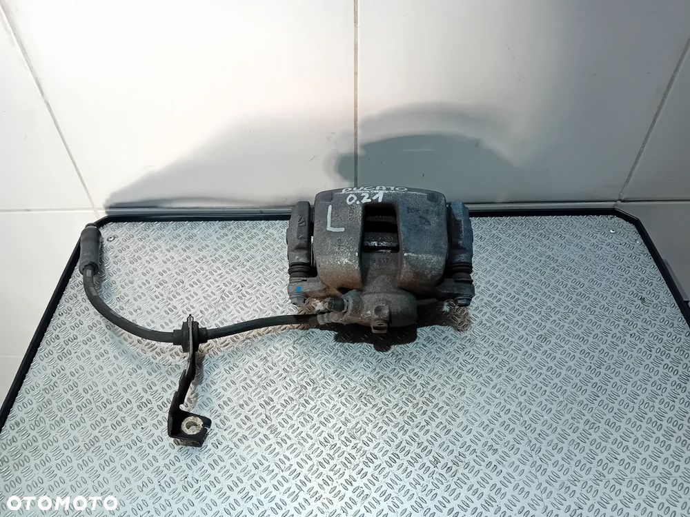 zacisk hamulcowy lewy tył Fiat Ducato III 2021 Y04075A - 1