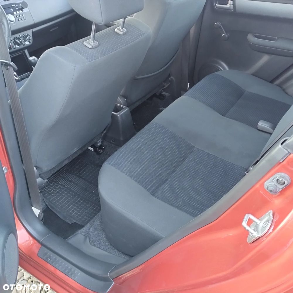 Suzuki Swift 1.3 Sakura - 12