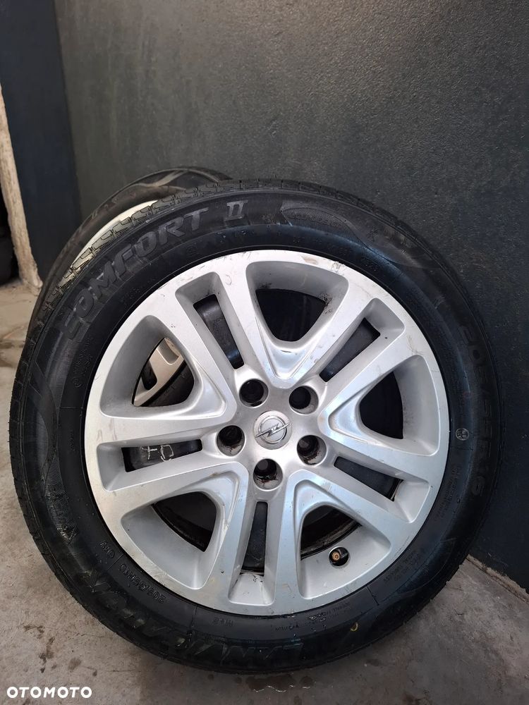 Felgi z kołpakami nowe opony Opel Astra K 5x105 - 4