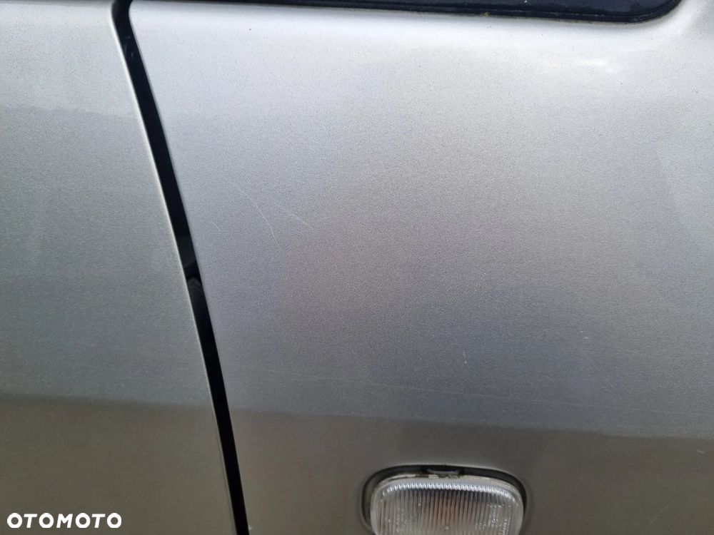 TOYOTA COROLLA VERSO II 04-07 2004 r. 1C0 błotnik prawy przód PP * - 9