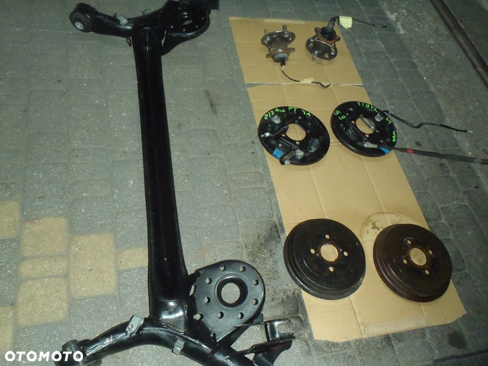 bęben szczęki cylinderek rozpierak hamulec tylny osłona tarcza kotwiczna kostka abs z zawieszenie tył toyota yaris II III 2 3 jak nowe - 6