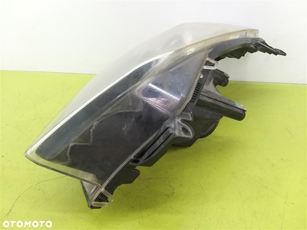 Reflektor lampa przód prawa Opel Astra III H 2004-2013 HELLA  1EG27037002 - 5