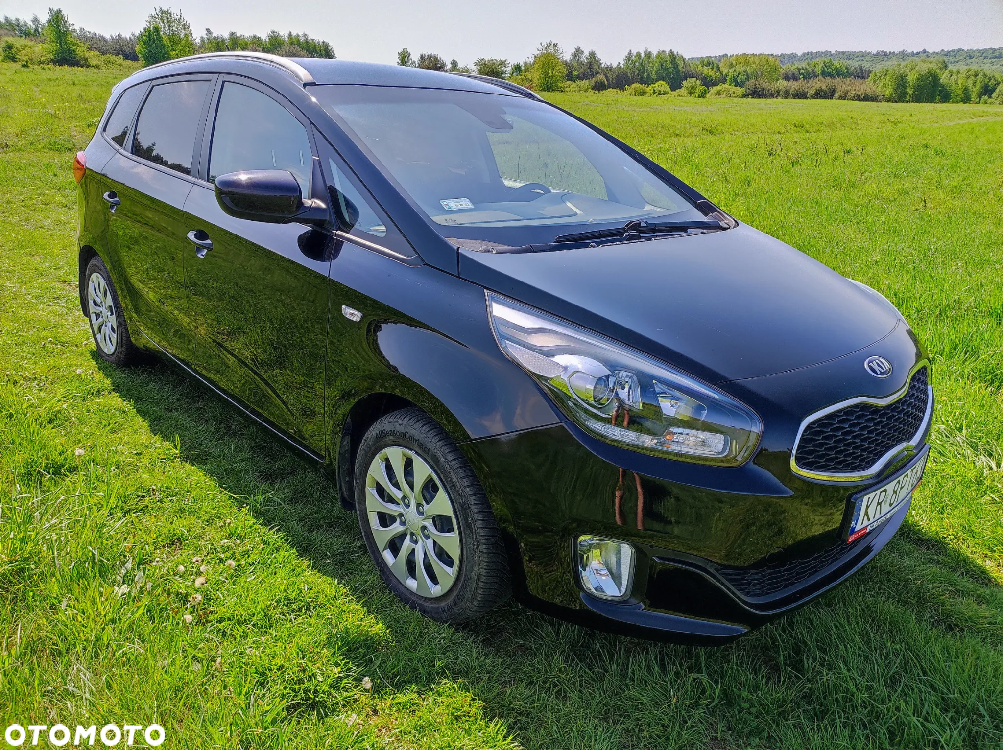 Kia Carens - 4
