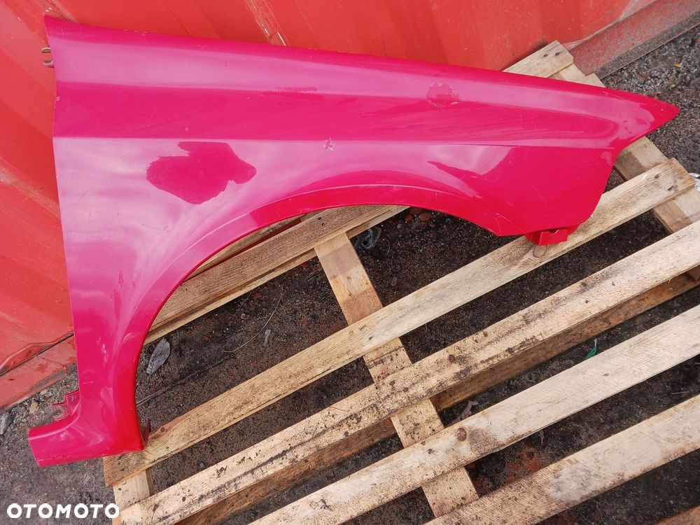 BŁOTNIK PRAWY PRZÓD RENAULT LAGUNA II 2 RÓŹOWY - 1