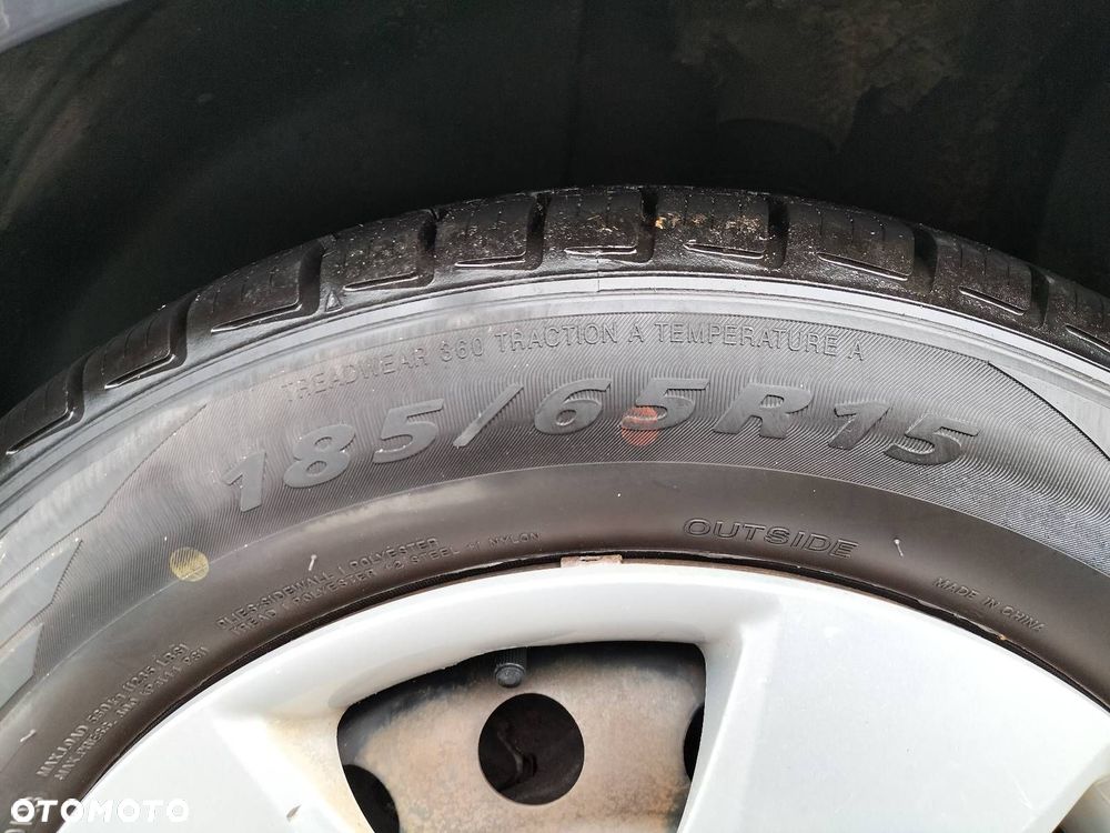 KOŁA FELGI KOŁPAKI OPONY CAŁOROCZNE 5X114,3 X15 FI67,1 185/65R15 KIA - 7