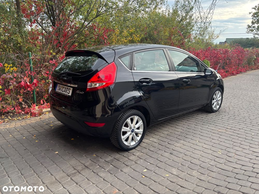 Ford Fiesta 1.4 Ghia - 8