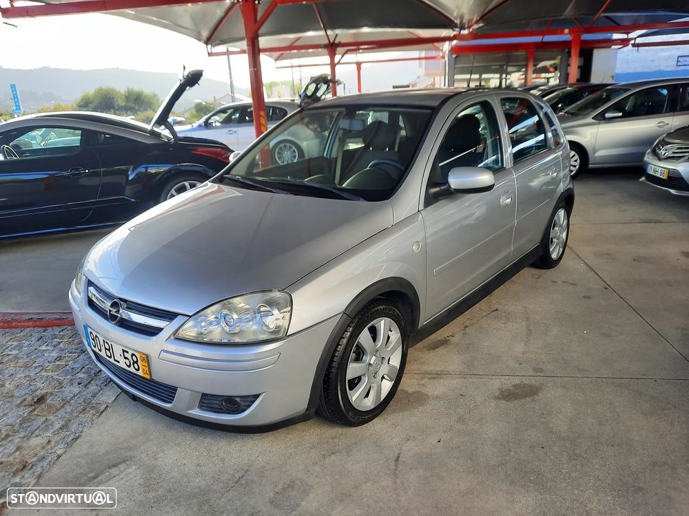 Opel Corsa 1.2 Twinport Cosmo - 1