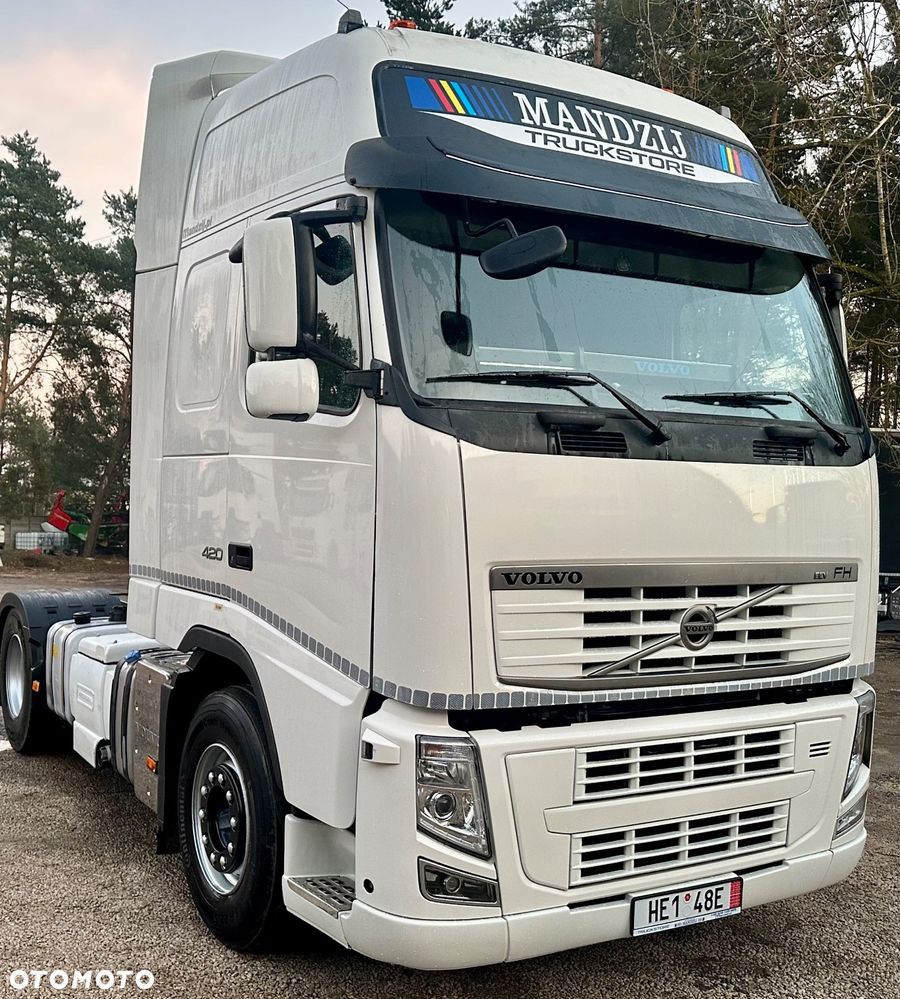 Volvo FH420 GLOB XXL AUTOMAT SPOJLERY KLIMA WEBASTO HYDRAULIKA DO WTWROTU KOMPRESOR DO WYDMUCHU 790000km NOWE TACHO!!! XENONY SKÓRA LODÓWKA EURO 5 EEV 2011r IGŁA
