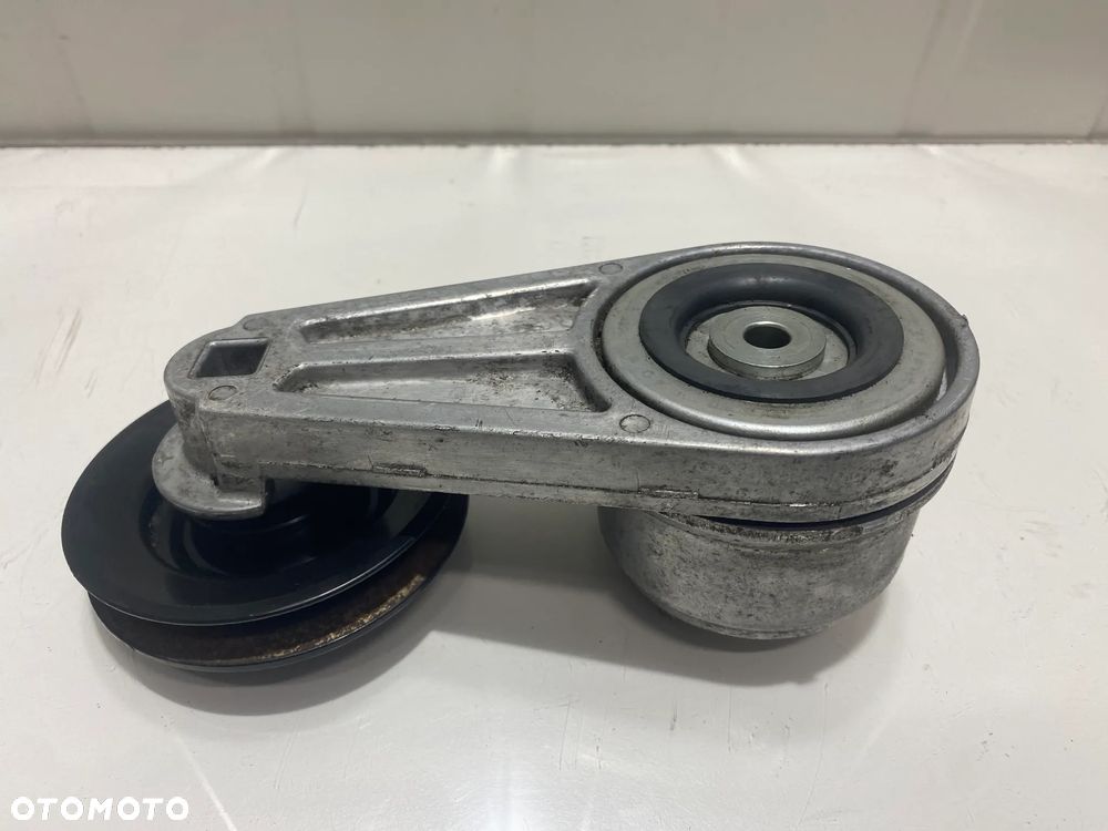 NAPINACZ PASKA WENTYLATORA RÓŻNICOWEGO JOHN DEERE W540 AXE22617 - 3