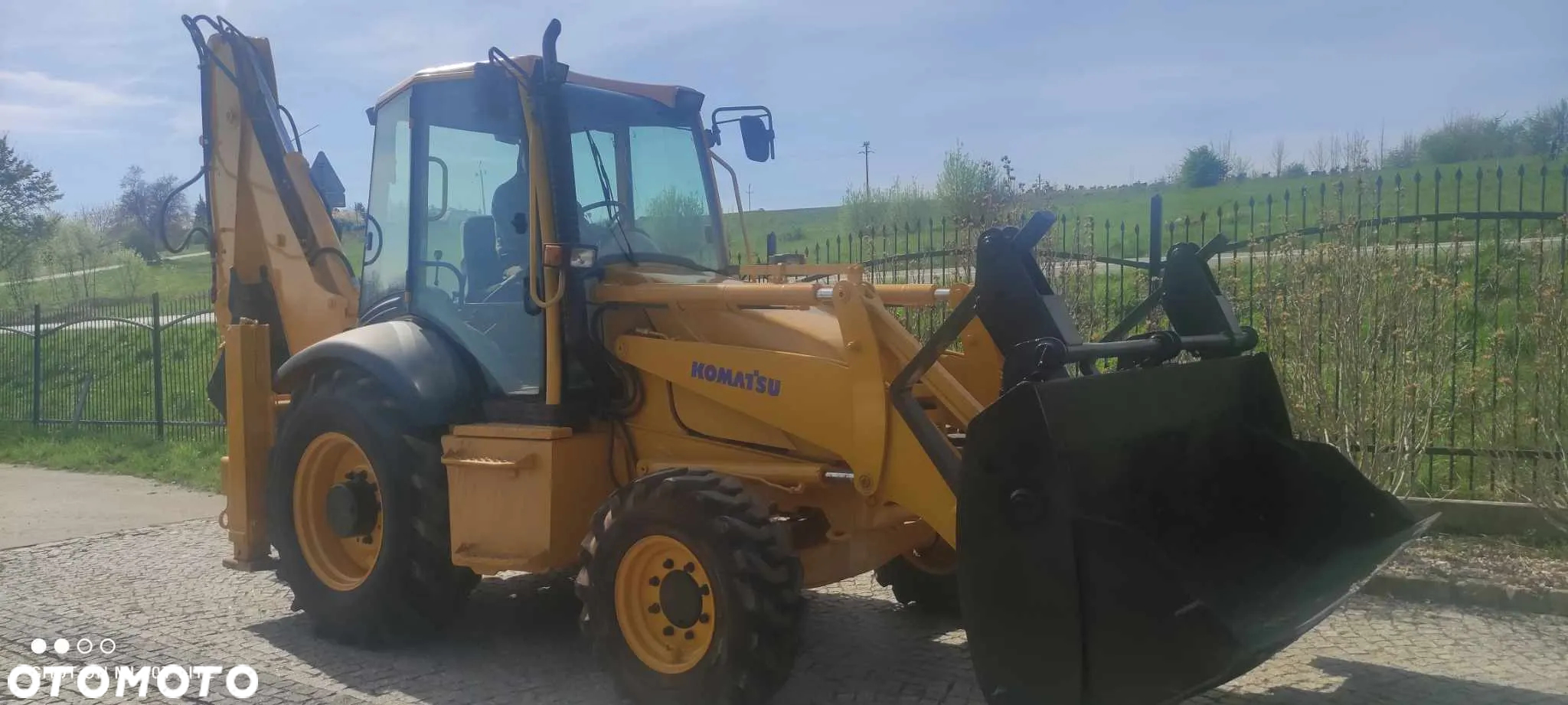 JCB koparko-ładowarka KOMATSU WB97 jcb 3cx - 9