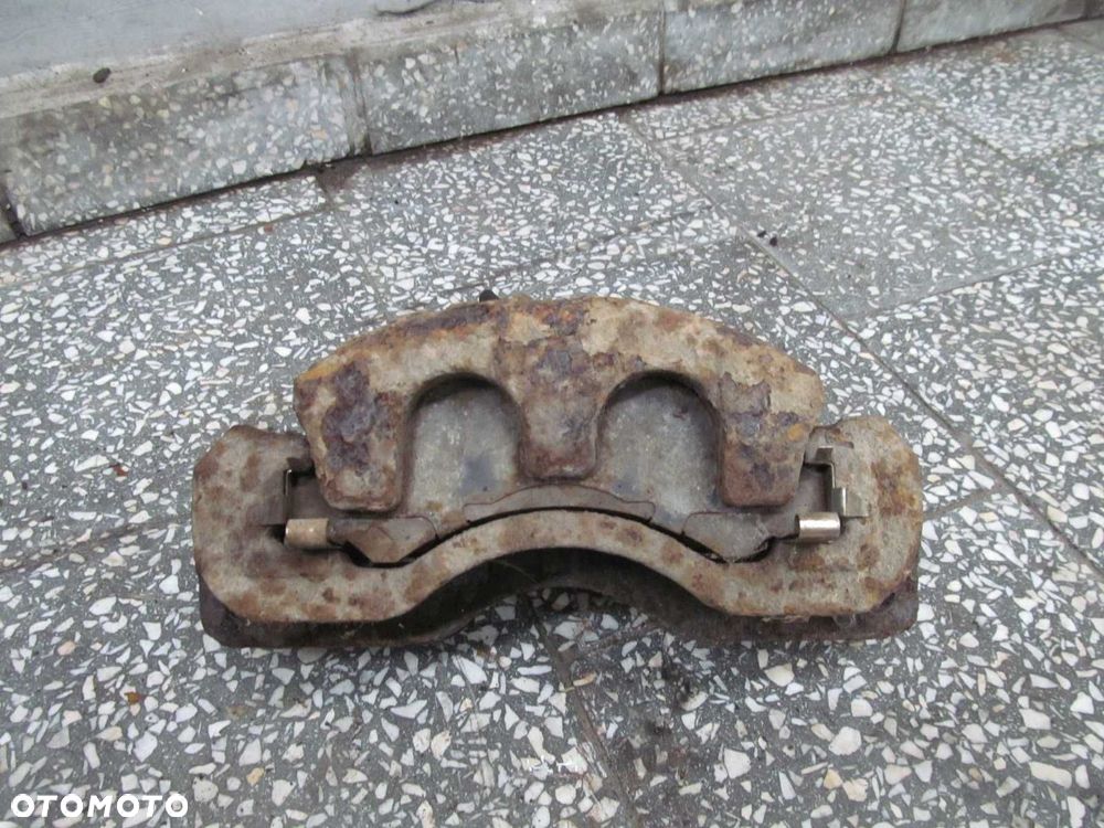 ISUZU N35 N GRAFTER NPR L ZACISK HAMULCOWY TYL PRAWY 07-18 - 2