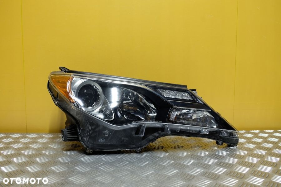 TOYOTA RAV4 2013- REFLEKTOR LAMPA PRAWA ZWYKŁA SOCZEWKOWA USA - 1