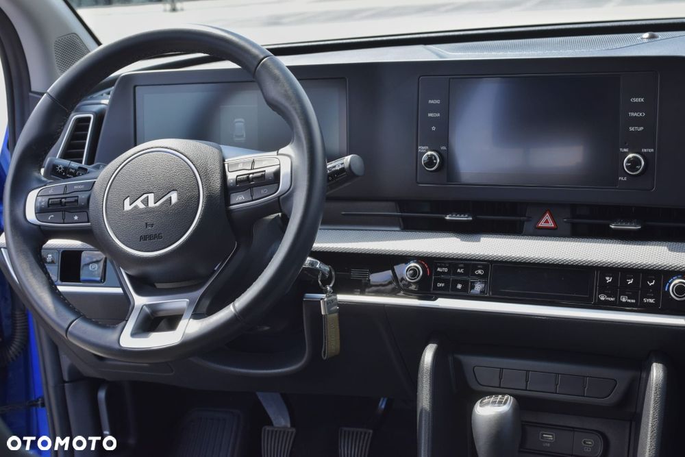 Kia Sportage - 4