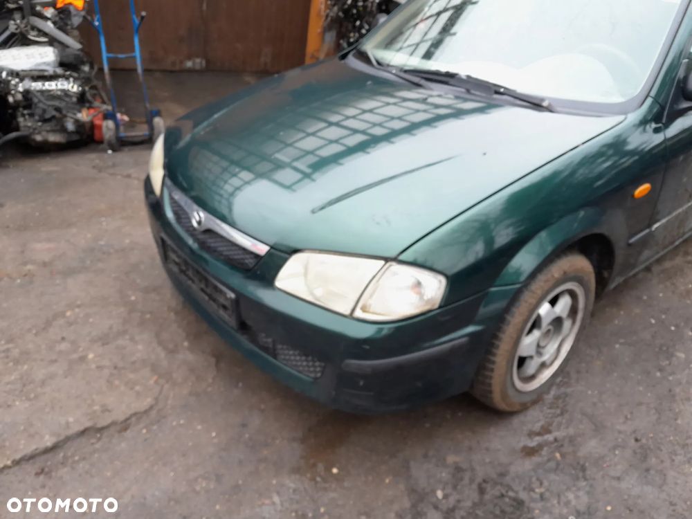 Mazda 323 323f 323  BJ 98-03  Maska lampa zderzak atrapa w kolor 18J - 5
