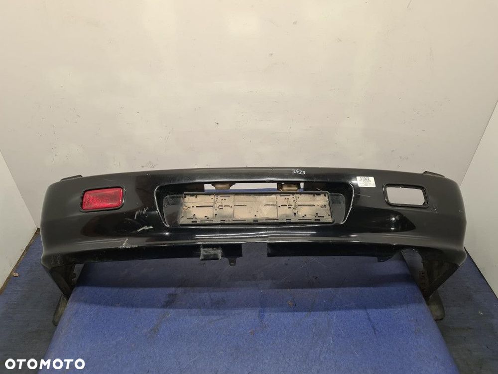 MITSUBISHI LANCER VII KOMBI ZDERZAK TYŁ  X42A - 1