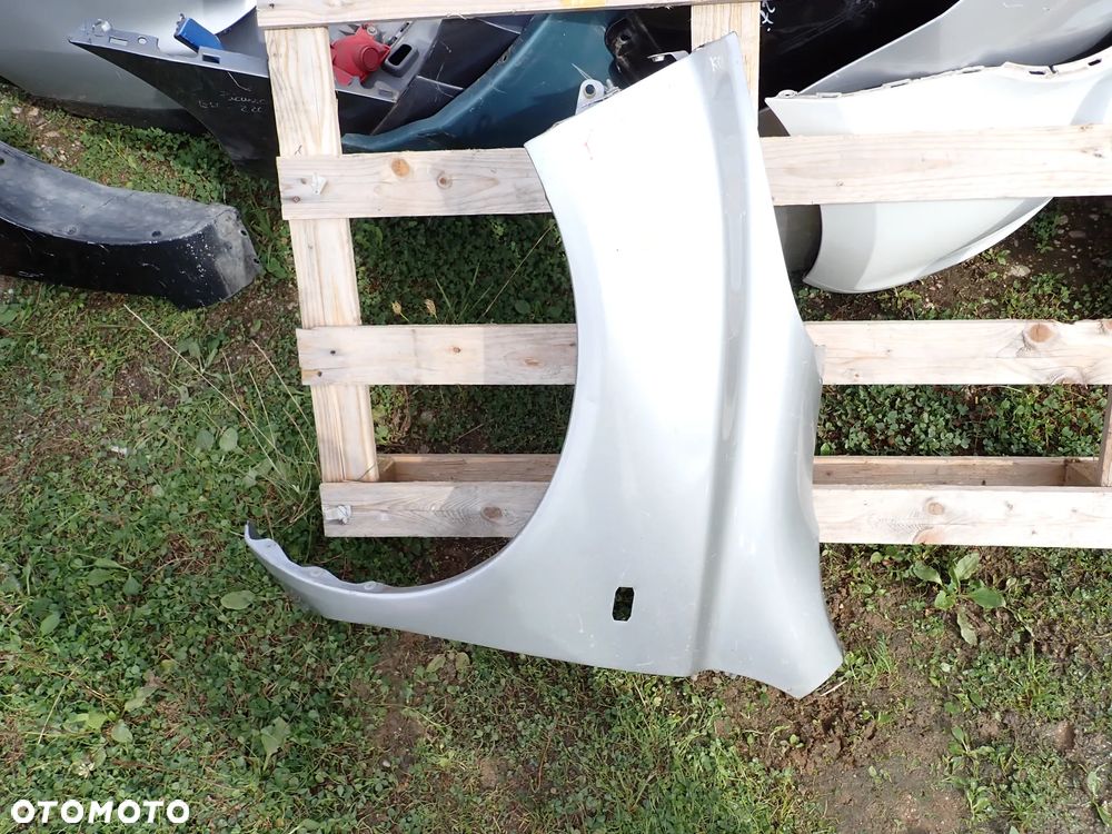 NISSAN MICRA K12 BŁOTNIK LEWY PRZÓD - 1