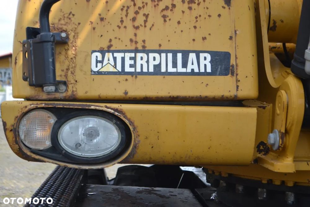 Caterpillar M315D - 13