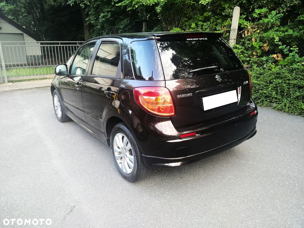 Suzuki SX4 1.6 Comfort Plus - 9
