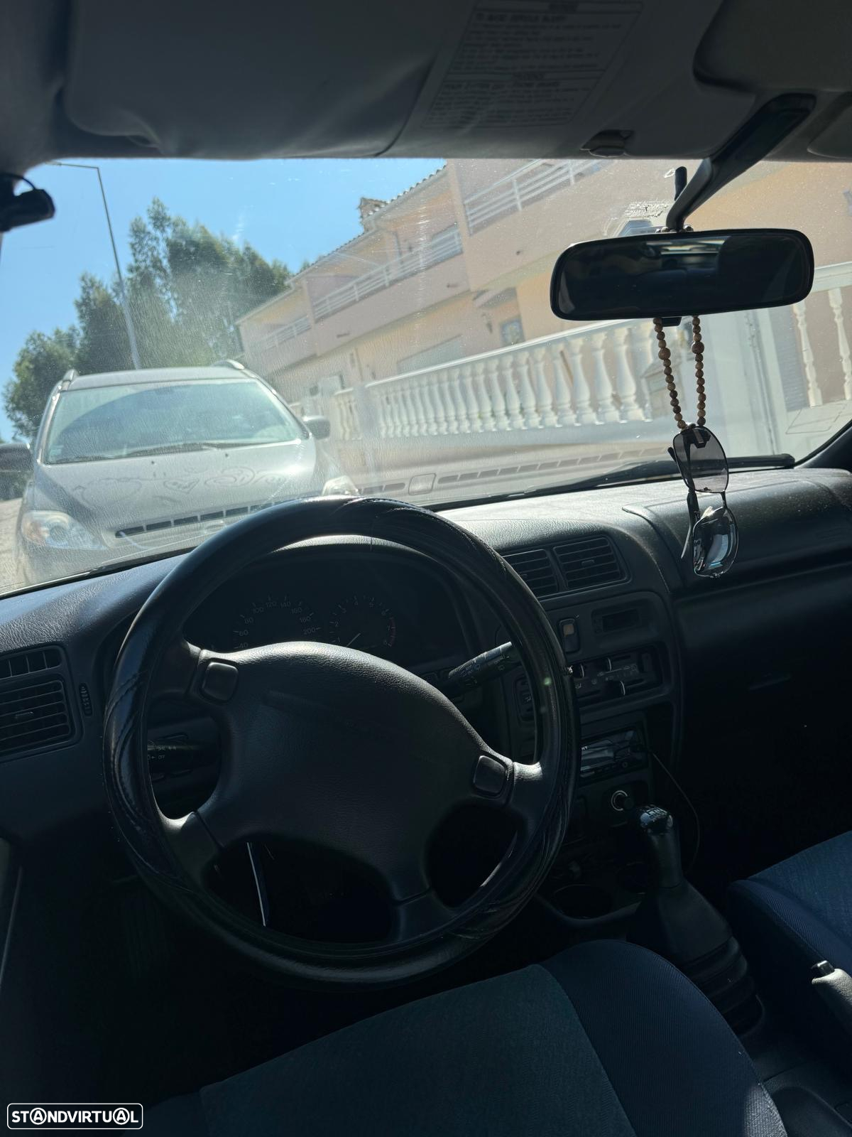 Mazda 323 F 1.5 - 5