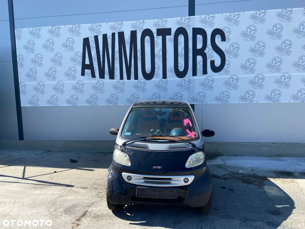 SMART 1999 *SAMOCHÓD NA CZĘŚCI* 2220 MASKA, LAMPA, DRZWI, LUSTERKO, ZDERZAK, GRILL, BŁOTNIK, KLAPA, BELKA, DESKA, FOTELE, KANAPA, ĆWIARTKA, KIEROWNICA, TARCZE, ZACISKI, ZAWIESZENIE, KOMPLETNY PRZÓD, KOMPLETNY TYŁ, LICZNIK, ZEGARY, PRAWE LEWE PRZÓD TYŁ - 4