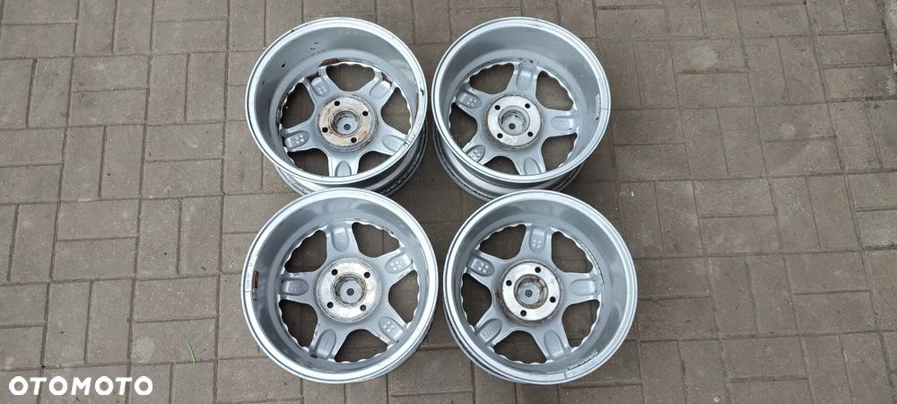 FELGI ALUMNIOWE WOLF 4x108 7Jx15 CALI ET40 INTRA fi 63,3 FORD ESCORT SIERA FOCUS FIESTA KOMPLET 4 SZTUKI - 7