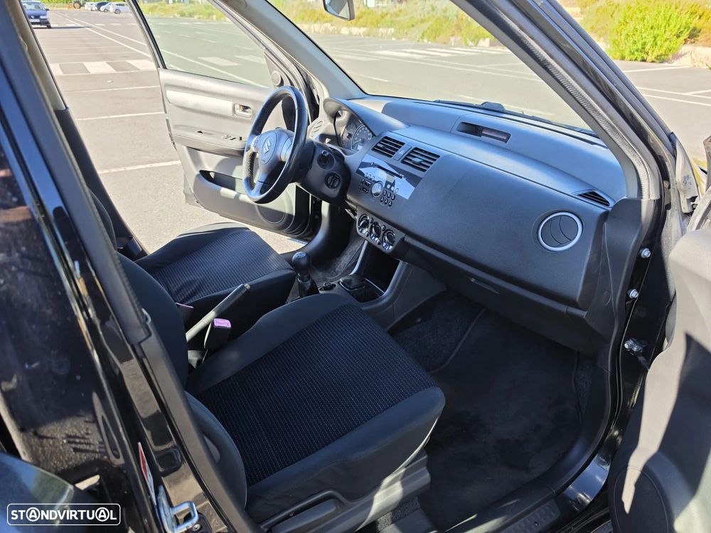 Suzuki Swift 1.3 16V GL - 9