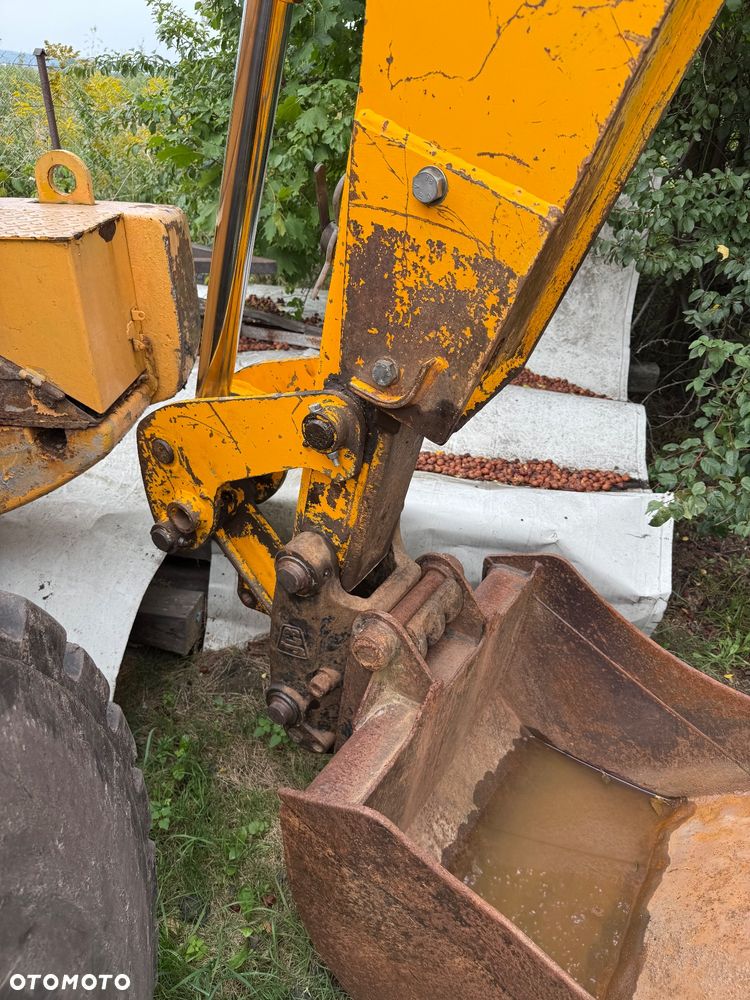 JCB 4CX SUPER 2002 rok na Umowe kupna stan bdb - 9