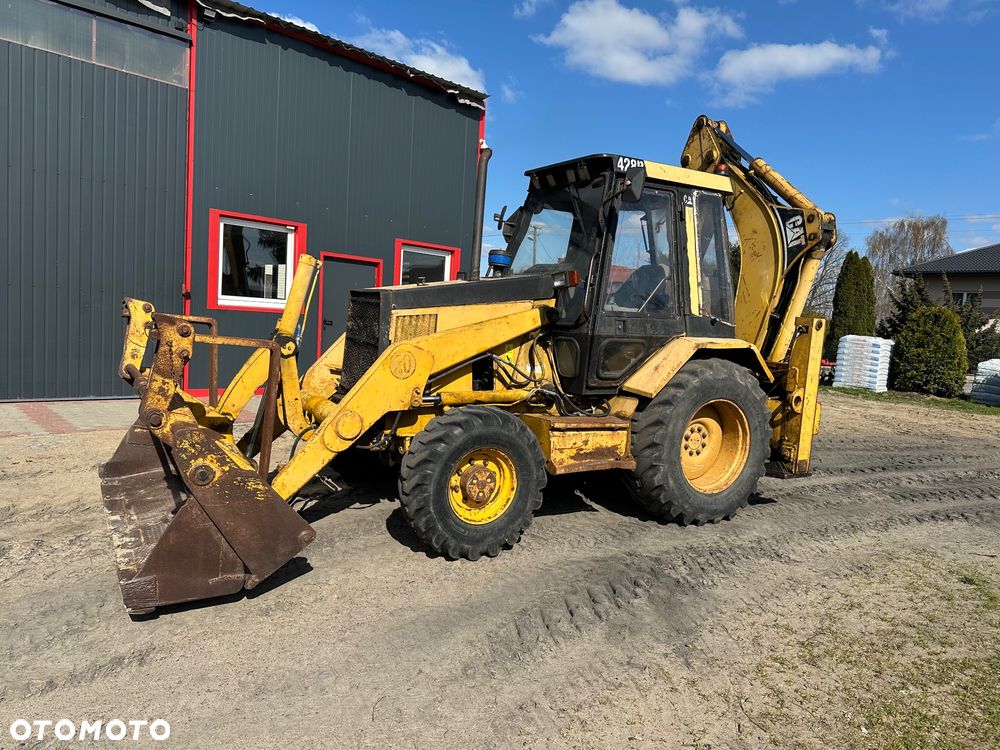 Caterpillar 428B ramię typu Banan - 3