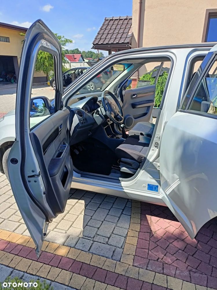 Suzuki Swift 1.3 Club - 4